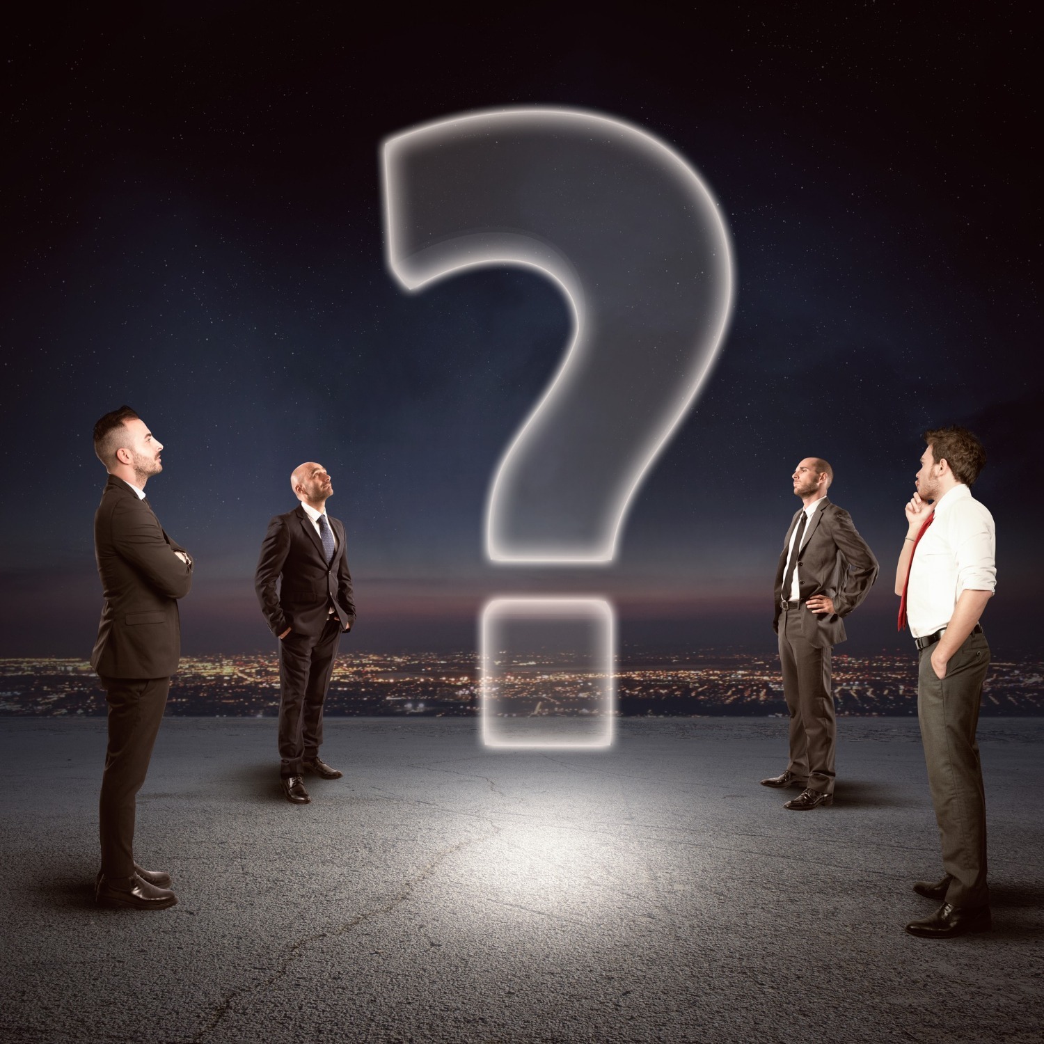 four executives pondering Why companies should consider e-learning for insider trading