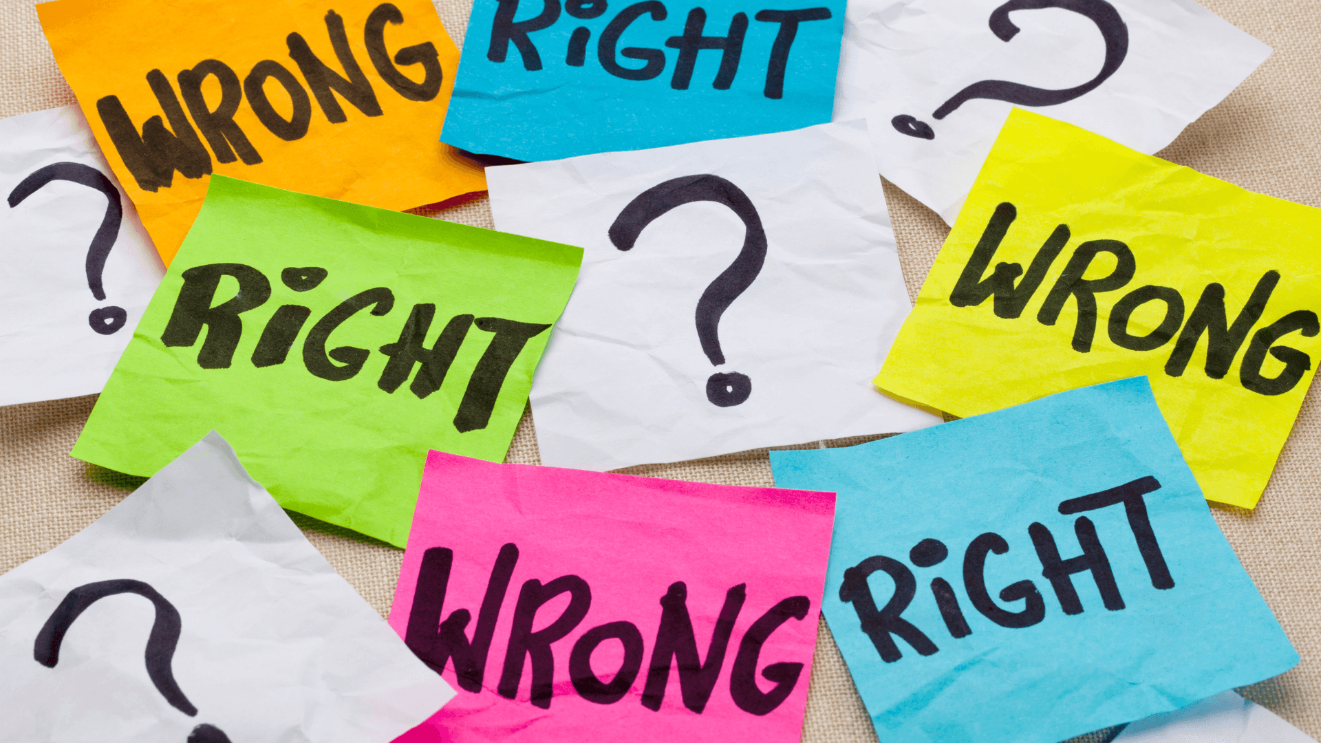 the image has colorful post its with right and wrong written over it with questions marks around it